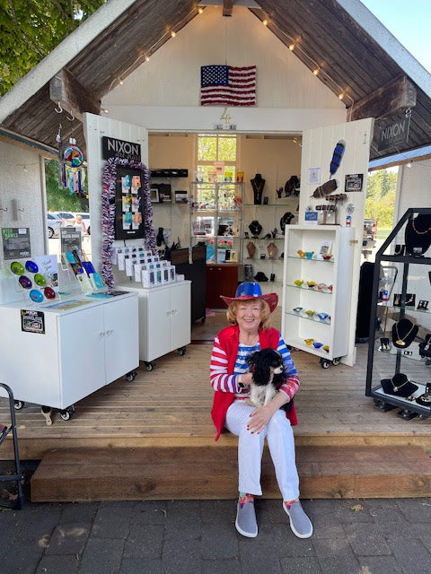 Darleen Nixon owner of Nixon Art Glass at Roche Harbor Artist Booth