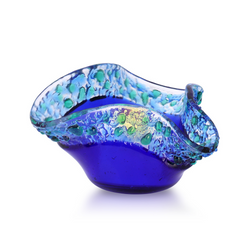 Deep blue art glass votive with wavy edges at the top